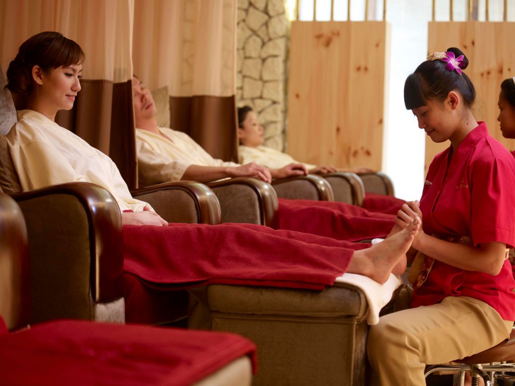 Therapist performing Foot Massage at Kenko Wellness Spa
